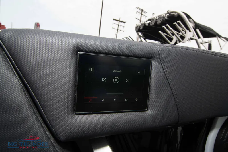Slide: The Image of 2023 MasterCraft X24 boat dashboard with integrated touchscreen display. - 48