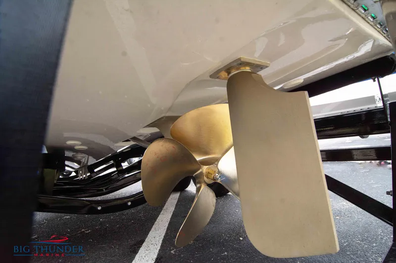 Slide: The Image of Close-up of 2023 MasterCraft X24 boat propeller and rudder. - 8