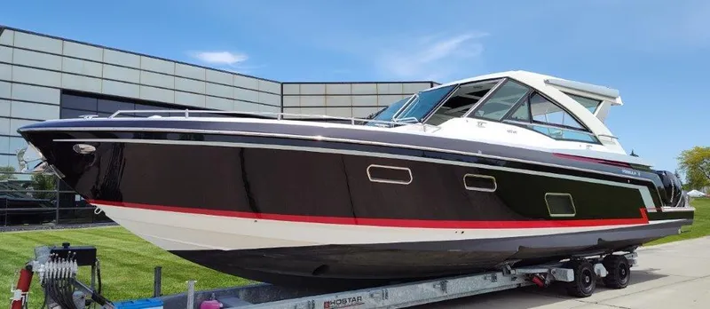 Slide: The Image of 2017 Formula 430 Super Sport Crossover boat on a trailer. - 2