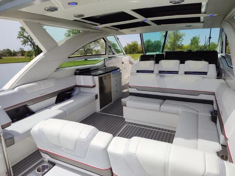 Slide: The Image of 2017 Formula 430 Super Sport Crossover luxury boat interior with white seating. - 20