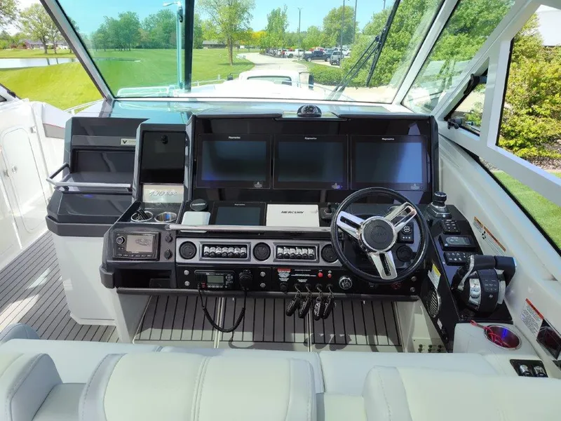 Slide: The Image of 2017 Formula 430 Super Sport Crossover boat cockpit with advanced navigation system. - 24