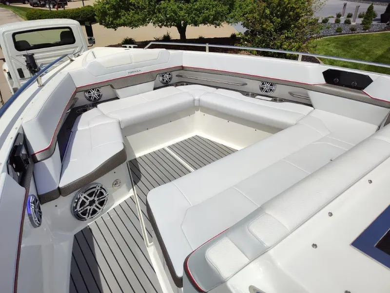 Slide: The Image of 2017 Formula 430 Super Sport Crossover boat with spacious seating area and modern design. - 32