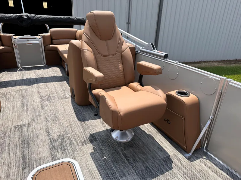 Slide: The Image of 2023 Avalon Catalina Quad Lounger 25 boat with luxurious tan seating. - 9