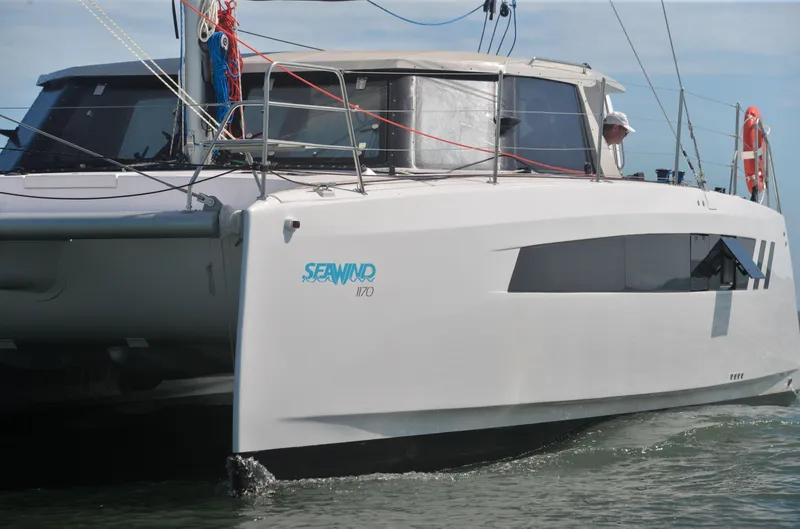 The Image of 2025 Seawind 1170 catamaran sailing on calm waters. - 0
