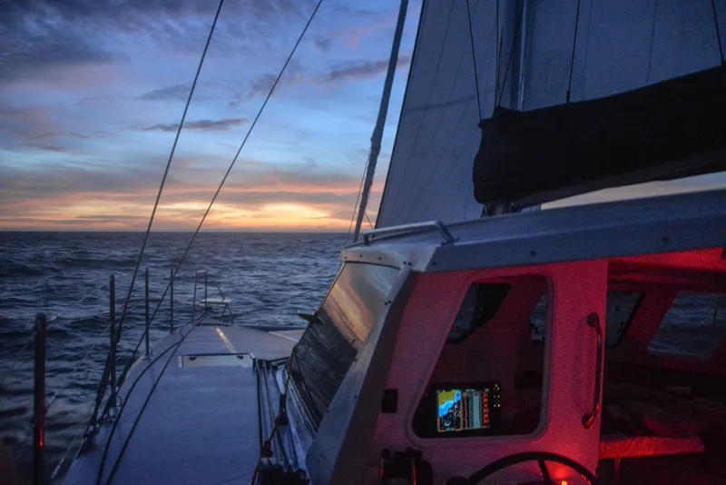 Slide: The Image of Seawind 1170 sailing at sunset, 2025 model, ocean view. - 15