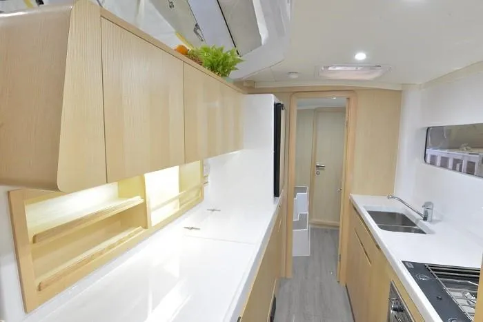 Slide: The Image of Modern kitchen interior of 2025 Seawind 1170 yacht with sleek cabinetry and appliances. - 23