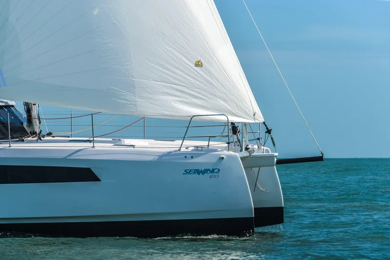 Slide: The Image of 2025 Seawind 1170 catamaran sailing on the ocean. - 4