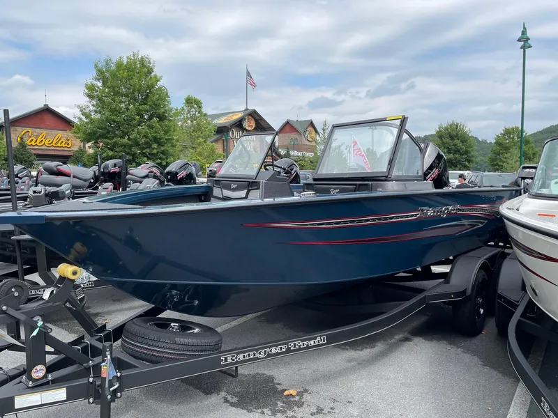 Slide: The Image of 2023 Ranger VX1888 WT boat on trailer at outdoor dealership. - 0