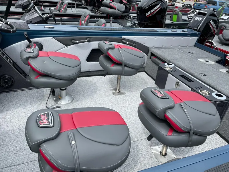 Slide: The Image of 2023 Ranger VX1888 WT boat interior with red and gray seating. - 3