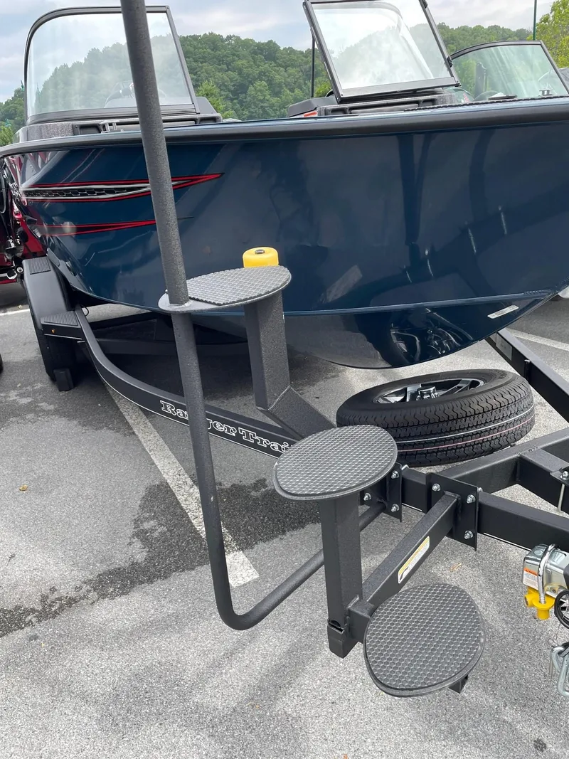 Slide: The Image of 2023 Ranger VX1888 WT boat on a trailer with step ladder. - 4