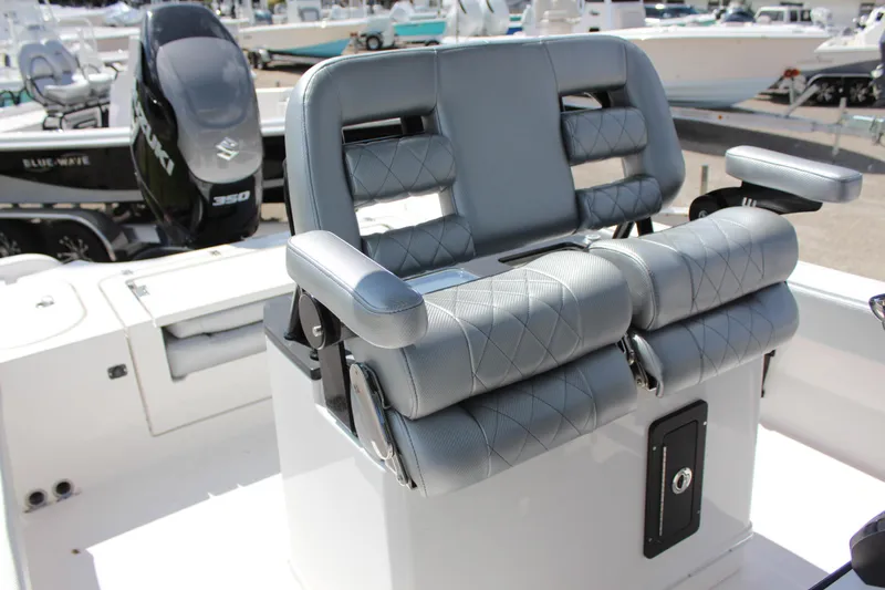 Slide: The Image of 2023 Blue Wave 2600 Makaira boat seating and console. - 6
