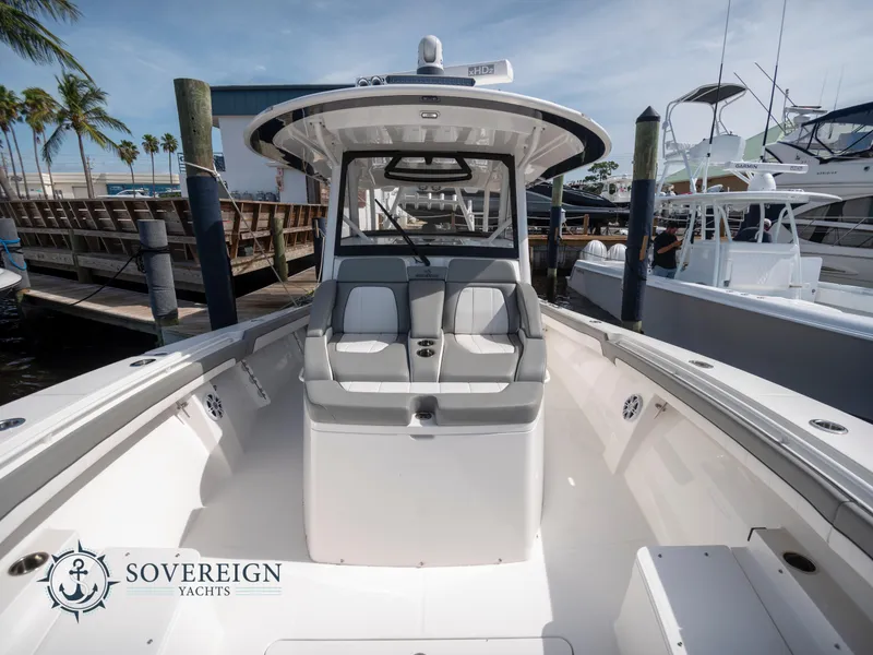 Slide: The Image of 2023 Regulator 41 yacht at dock, Sovereign Yachts branding visible. - 15