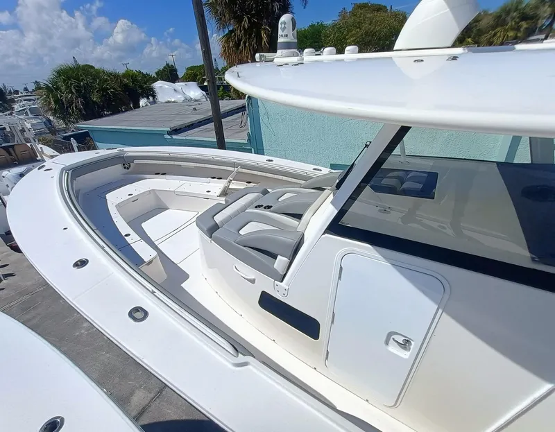 Slide: The Image of 2023 Regulator 41 boat with sleek design and spacious seating area. - 2