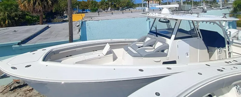 Slide: The Image of 2023 Regulator 41 boat with sleek design, spacious deck, and modern features. - 3