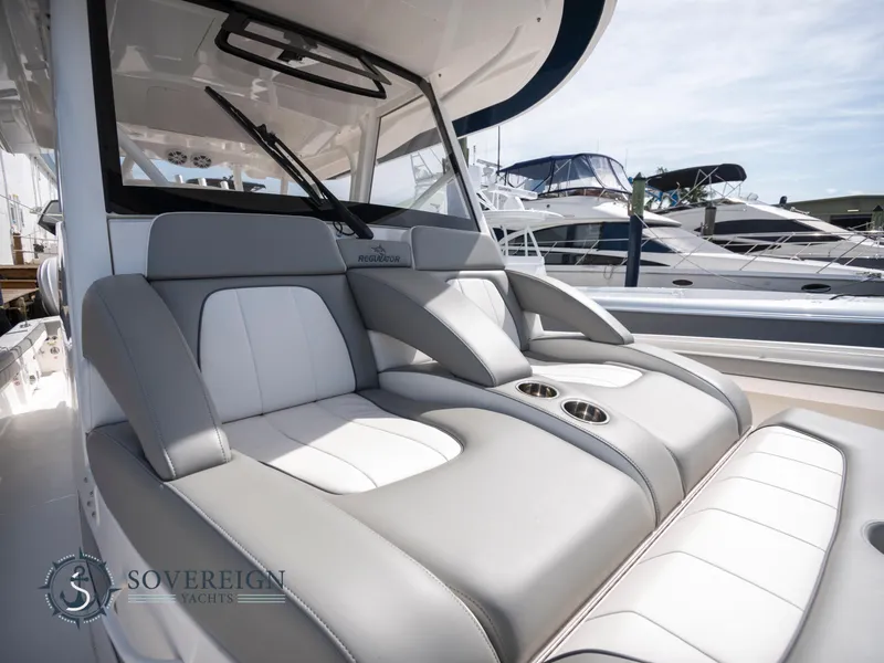 Slide: The Image of Luxurious seating on the 2023 Regulator 41 yacht at Sovereign Yachts marina. - 40