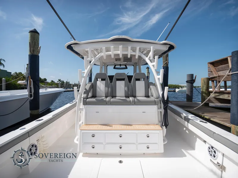 Slide: The Image of 2023 Regulator 41 yacht at dock, rear seating and storage view. - 5