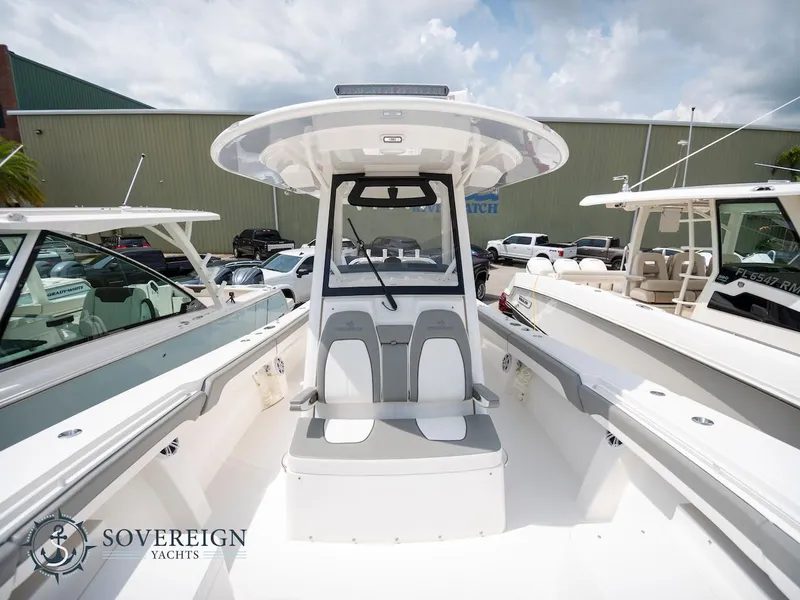 Slide: The Image of 2023 Regulator 34 boat at Sovereign Yachts dealership. - 11