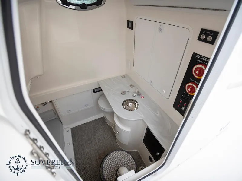 Slide: The Image of 2023 Regulator 34 boat interior with sink and control panel. - 13