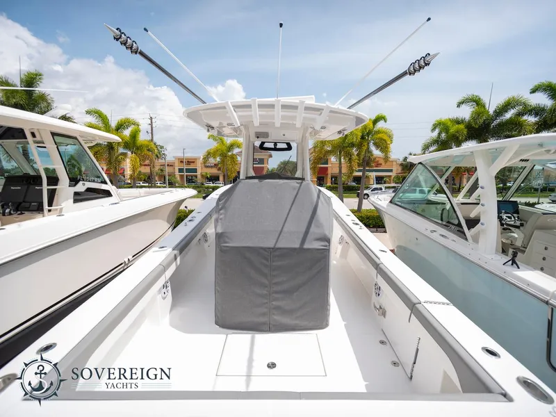 Slide: The Image of 2023 Regulator 34 boat on display at Sovereign Yachts dealership. - 8