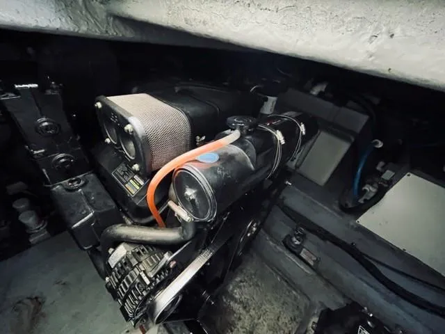 Slide: The Image of Engine compartment of a 2001 Sea Ray 340 AJ boat. - 26