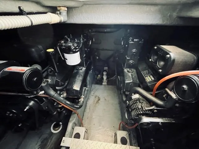 Slide: The Image of Engine compartment of a 2001 Sea Ray 340 AJ boat. - 27