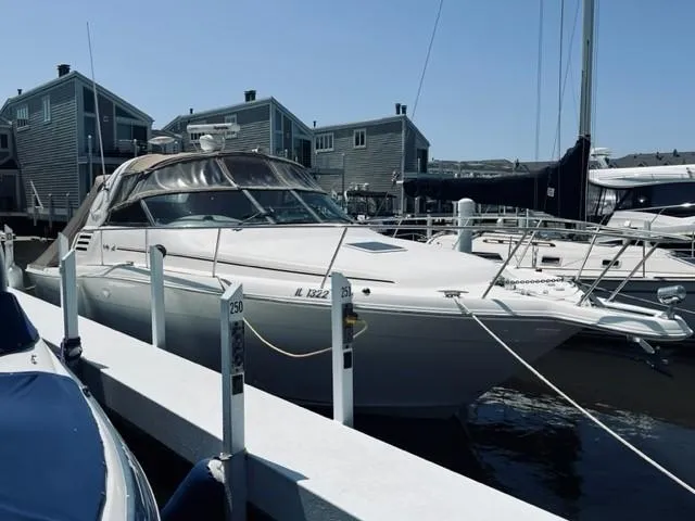 Slide: The Image of 2001 Sea Ray 340 AJ docked at a marina. - 30