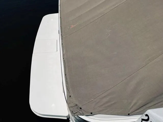 Slide: The Image of 2001 Sea Ray 340 AJ boat with covered deck. - 8