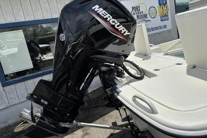 Slide: The Image of 2023 Mako SKIFF 19 CC boat with Mercury outboard motor at Port Harbor Marine. - 20