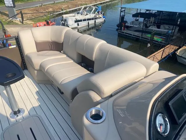Slide: The Image of Luxurious seating on 2023 SunCatcher Fusion 324SS pontoon boat at dock. - 15