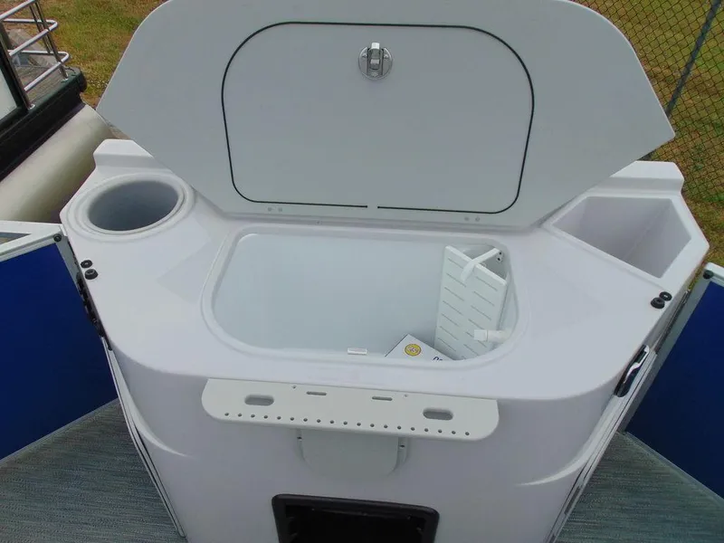 Slide: The Image of 2023 Godfrey Sweetwater 2286 FS boat storage compartment with cup holder and latch. - 10