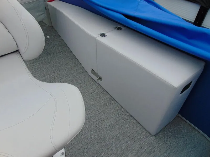 Slide: The Image of Interior of 2023 Godfrey Sweetwater 2286 FS boat with white seating and storage. - 4