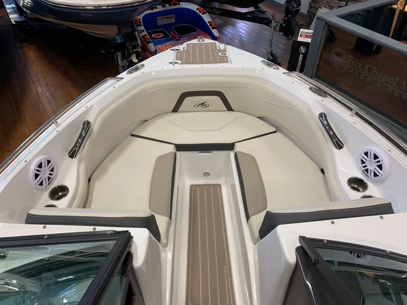 Slide: The Image of 2024 Monterey 224FS boat interior with beige seating and modern design. - 3