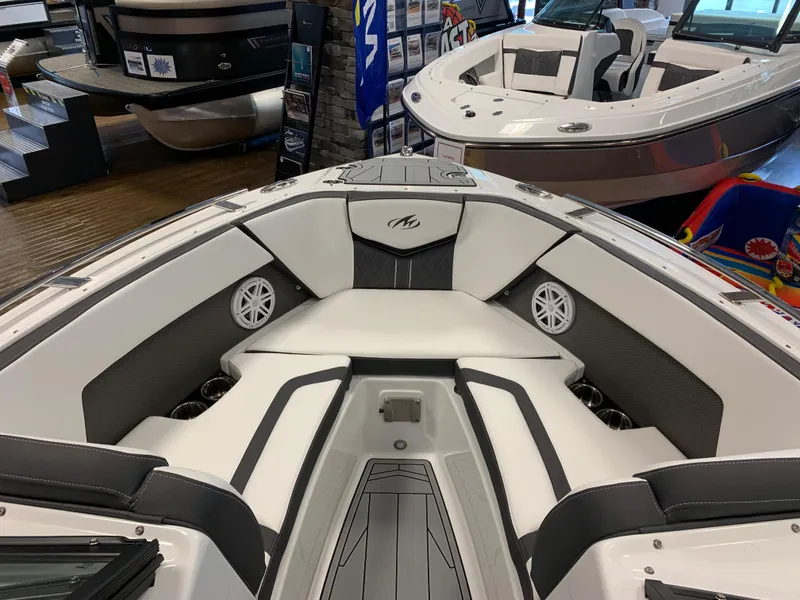 Slide: The Image of 2024 Monterey 238 Super Sport boat interior with sleek seating and modern design. - 13