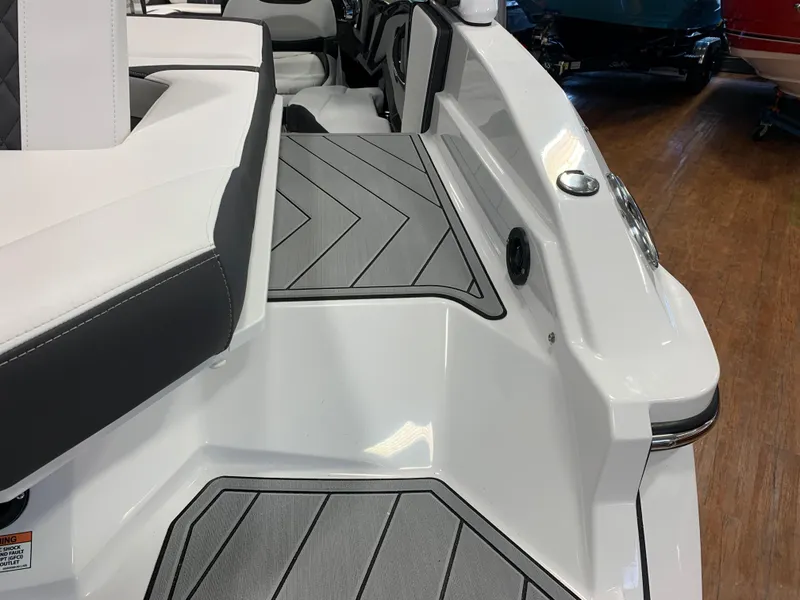 Slide: The Image of 2024 Monterey 238 Super Sport boat interior with sleek seating and modern design. - 6