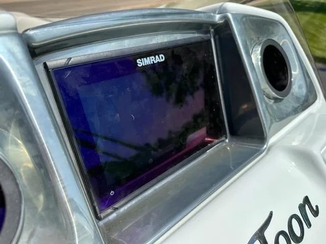 Slide: The Image of Simrad display on 2023 JC Neptoon 25 SB Sport boat dashboard. - 12