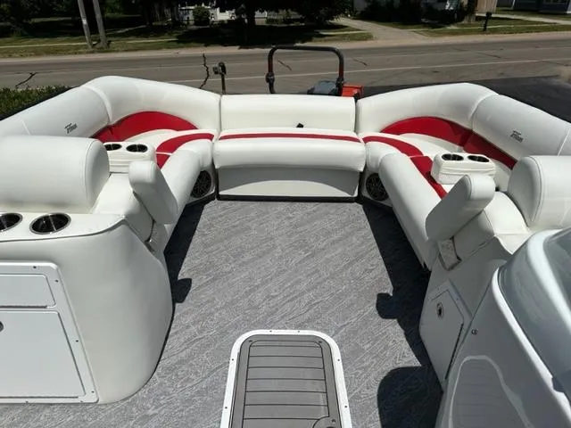 Slide: The Image of 2023 JC Neptoon 25 SB Sport boat interior with white and red seating. - 13