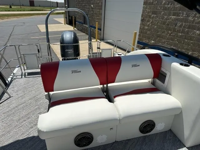 Slide: The Image of 2023 JC Neptoon 25 SB Sport boat with red and white seating and powerful engine. - 7