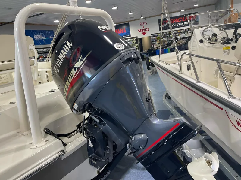 Slide: The Image of 2023 Stingray 173CC boat with Yamaha outboard motor in showroom. - 8