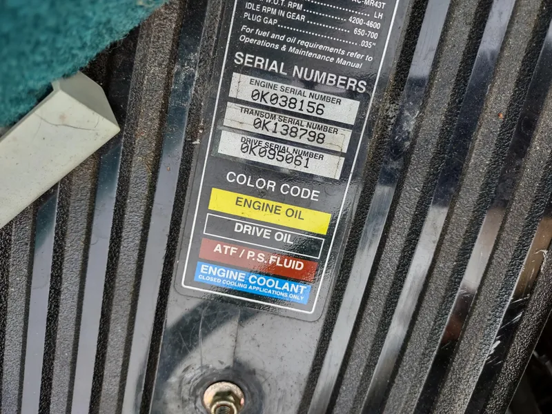 Slide: The Image of Serial number and color code label on 1997 Sea Ray 240 SIGNATURE boat engine. - 27