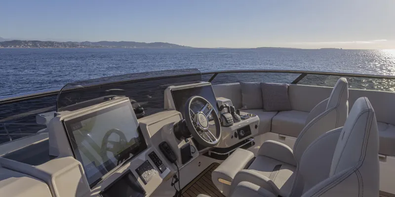 Slide: The Image of Luxurious 2025 Absolute NAVETTA 75 yacht helm with ocean view. - 13
