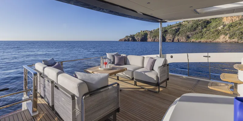 Slide: The Image of Luxurious deck of 2025 Absolute NAVETTA 75 yacht with ocean view. - 14