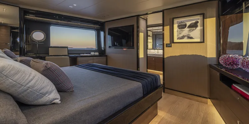 Slide: The Image of Luxurious bedroom interior of 2025 Absolute NAVETTA 75 yacht with modern decor. - 30