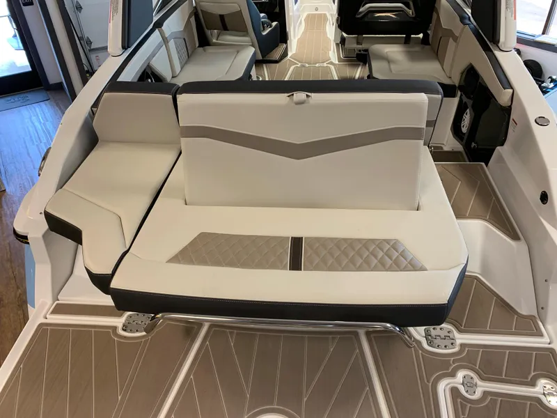 Slide: The Image of 2024 Monterey 278 Super Sport boat interior with stylish seating and modern design. - 11