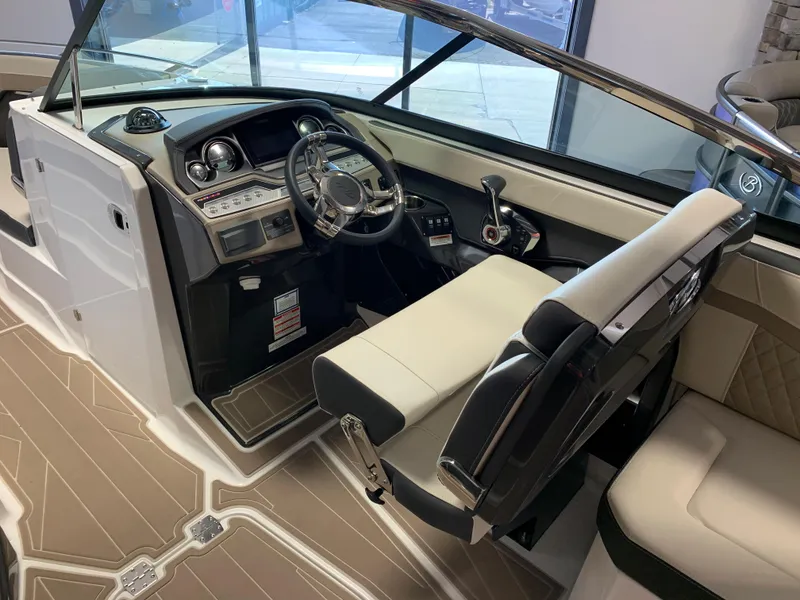 Slide: The Image of 2024 Monterey 278 Super Sport boat interior with modern dashboard and seating. - 3