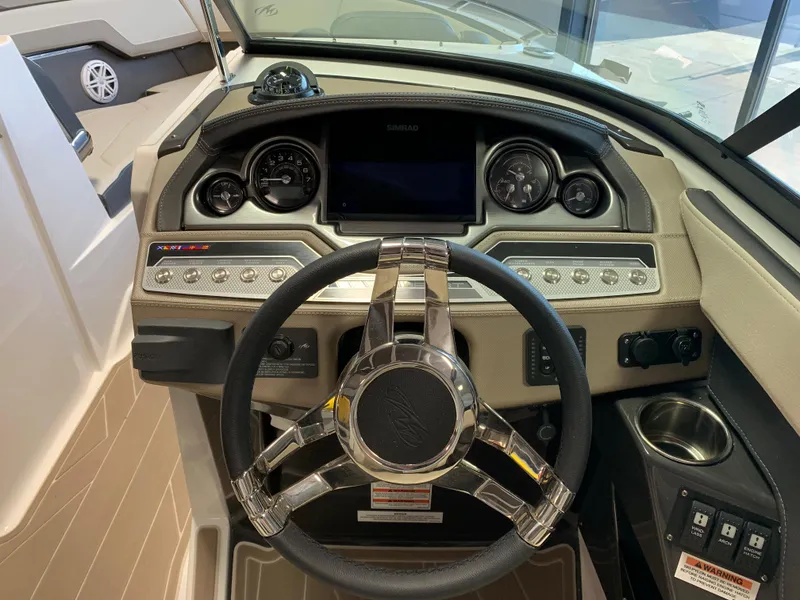 Slide: The Image of 2024 Monterey 278 Super Sport dashboard with steering wheel and control panel. - 4