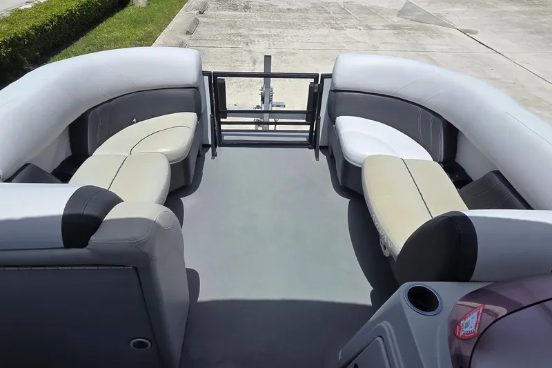 Slide: The Image of 2022 Sylvan Mirage X X3 pontoon boat interior with spacious seating arrangement. - 4
