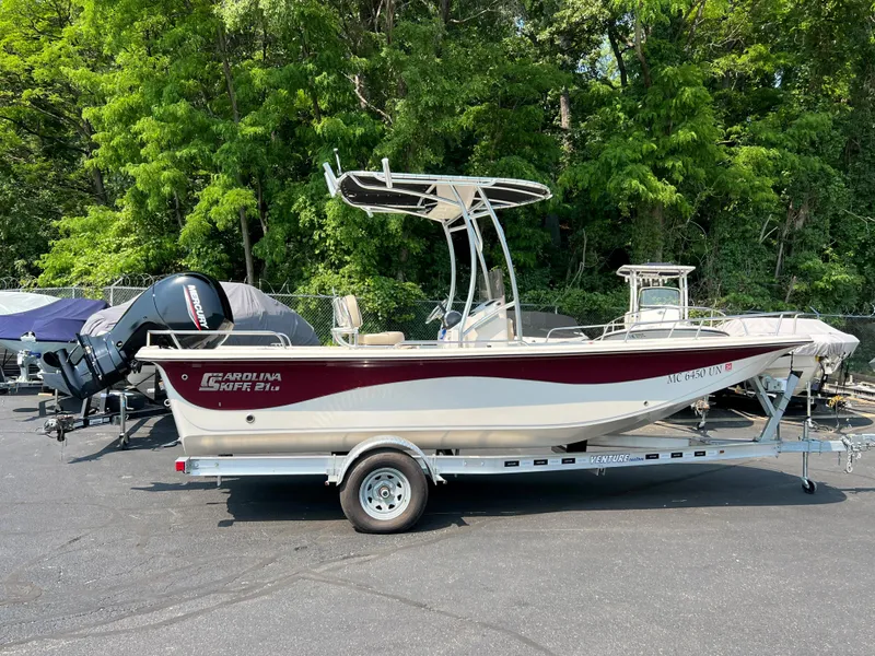 The Image of 2020 Carolina Skiff 21 LS boat on trailer, parked outdoors. - 0