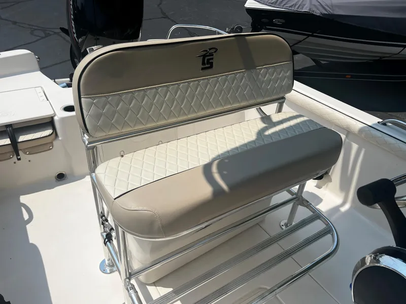 Slide: The Image of 2020 Carolina Skiff 21 LS boat seat with diamond-pattern upholstery. - 14