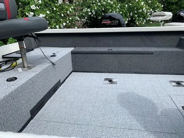 Slide: The Image of 2023 Ranger VS1882SC Angler boat interior with seating and storage compartments. - 3