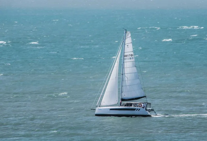 Slide: The Image of 2025 Seawind 1170 sailing on open ocean waters. - 38